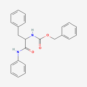 molecular formula C23H22N2O3 B2890022 Benzyl N-[2-phenyl-1-(phenylcarbamoyl)ethyl]carbamate CAS No. 126787-17-5