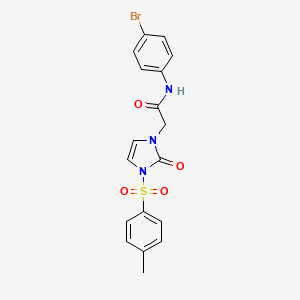 molecular formula C18H16BrN3O4S B2890360 N-(4-bromophenyl)-2-(2-oxo-3-tosyl-2,3-dihydro-1H-imidazol-1-yl)acetamide CAS No. 932459-59-1