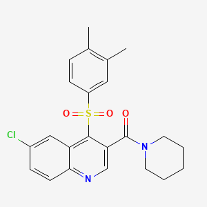 molecular formula C23H23ClN2O3S B2890690 6-Chloro-4-[(3,4-dimethylphenyl)sulfonyl]-3-(piperidin-1-ylcarbonyl)quinoline CAS No. 1111164-78-3
