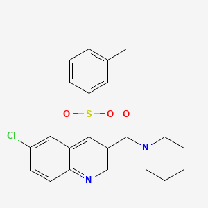 molecular formula C23H23ClN2O3S B2890690 6-氯-4-[(3,4-二甲苯基)磺酰基]-3-(哌啶-1-基羰基)喹啉 CAS No. 1111164-78-3