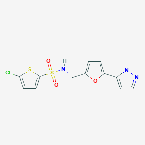 molecular formula C13H12ClN3O3S2 B2890769 5-Chloro-N-[[5-(2-methylpyrazol-3-yl)furan-2-yl]methyl]thiophene-2-sulfonamide CAS No. 2415623-71-9