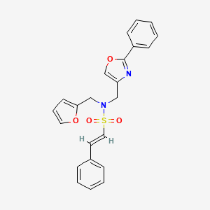 (E)-N-(furan-2-ylmethyl)-2-phenyl-N-[(2-phenyl-1,3-oxazol-4-yl)methyl]ethenesulfonamide