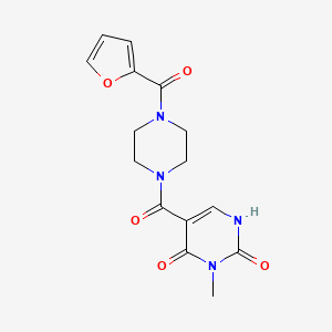 5-(4-(furan-2-carbonyl)piperazine-1-carbonyl)-3-methylpyrimidine-2,4(1H,3H)-dione