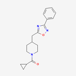 molecular formula C18H21N3O2 B2894507 1-(Cyclopropylcarbonyl)-4-[(3-phenyl-1,2,4-oxadiazol-5-yl)methyl]piperidine CAS No. 1775325-95-5