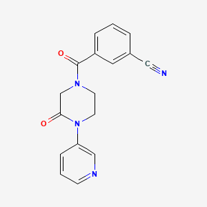 3-[3-Oxo-4-(pyridin-3-yl)piperazine-1-carbonyl]benzonitrile