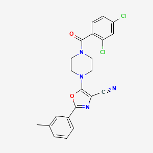 molecular formula C22H18Cl2N4O2 B2894564 5-(4-(2,4-二氯苯甲酰)哌嗪-1-基)-2-(间甲苯基)恶唑-4-腈 CAS No. 946277-90-3