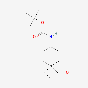 molecular formula C14H23NO3 B2895350 叔丁基 N-(3-氧代螺[3.5]壬-7-基)氨基甲酸酯 CAS No. 2260766-12-7