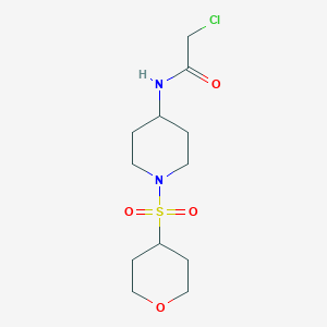 molecular formula C12H21ClN2O4S B2895439 2-Chloro-N-[1-(oxan-4-ylsulfonyl)piperidin-4-yl]acetamide CAS No. 2411243-45-1