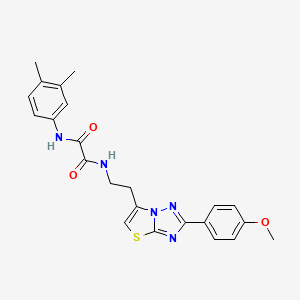 molecular formula C23H23N5O3S B2896503 N1-(3,4-dimethylphenyl)-N2-(2-(2-(4-methoxyphenyl)thiazolo[3,2-b][1,2,4]triazol-6-yl)ethyl)oxalamide CAS No. 894032-71-4