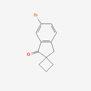 molecular formula C12H11BrO B2896530 6'-Bromospiro[cyclobutane-1,2'-inden]-1'(3'H)-one CAS No. 1383985-14-5