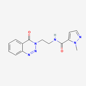 molecular formula C14H14N6O2 B2897047 1-methyl-N-(2-(4-oxobenzo[d][1,2,3]triazin-3(4H)-yl)ethyl)-1H-pyrazole-5-carboxamide CAS No. 2034318-22-2