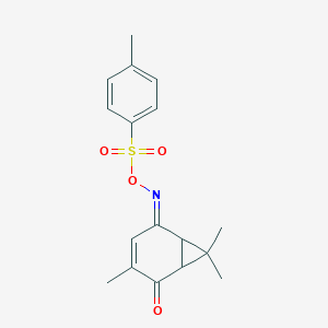 molecular formula C17H19NO4S B289901 3,7,7-Trimethyl-5-[{p-toluenesulfonyloxy}imino]bicyclo[4.1.0]hept-3-en-2-one 