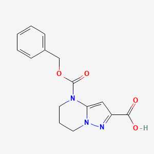 molecular formula C15H15N3O4 B2900705 4-Phenylmethoxycarbonyl-6,7-dihydro-5H-pyrazolo[1,5-a]pyrimidine-2-carboxylic acid CAS No. 2248342-36-9