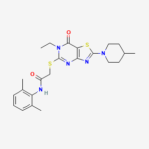 molecular formula C23H29N5O2S2 B2901090 N~1~-(2,6-dimethylphenyl)-2-{[6-ethyl-2-(4-methylpiperidino)-7-oxo-6,7-dihydro[1,3]thiazolo[4,5-d]pyrimidin-5-yl]sulfanyl}acetamide CAS No. 1207035-14-0