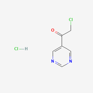 molecular formula C6H6Cl2N2O B2901288 2-Chloro-1-pyrimidin-5-ylethanone;hydrochloride CAS No. 2225147-01-1