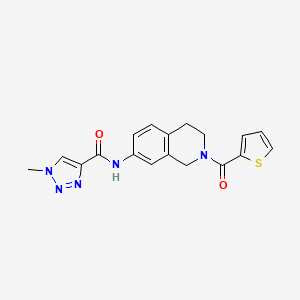 molecular formula C18H17N5O2S B2902320 1-methyl-N-(2-(thiophene-2-carbonyl)-1,2,3,4-tetrahydroisoquinolin-7-yl)-1H-1,2,3-triazole-4-carboxamide CAS No. 1448052-04-7