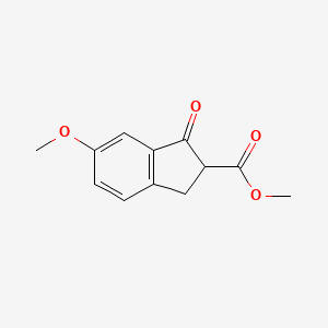 molecular formula C12H12O4 B2902380 Methyl 6-methoxy-1-oxo-2,3-dihydro-1H-indene-2-carboxylate CAS No. 22955-78-8