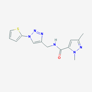 1,3-dimethyl-N-{[1-(thiophen-2-yl)-1H-1,2,3-triazol-4-yl]methyl}-1H-pyrazole-5-carboxamide