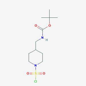 molecular formula C11H21ClN2O4S B2905091 Tert-butyl N-[(1-chlorosulfonylpiperidin-4-yl)methyl]carbamate CAS No. 2418733-73-8