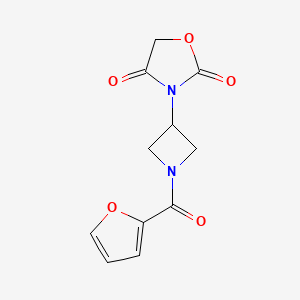 molecular formula C11H10N2O5 B2906290 3-(1-(Furan-2-carbonyl)azetidin-3-yl)oxazolidine-2,4-dione CAS No. 2034309-62-9