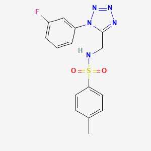 molecular formula C15H14FN5O2S B2906488 N-((1-(3-fluorophenyl)-1H-tetrazol-5-yl)methyl)-4-methylbenzenesulfonamide CAS No. 920466-64-4