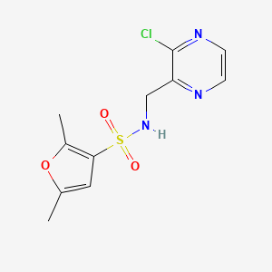 molecular formula C11H12ClN3O3S B2906497 N-[(3-chloropyrazin-2-yl)methyl]-2,5-dimethylfuran-3-sulfonamide CAS No. 2094284-15-6