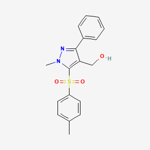 molecular formula C18H18N2O3S B2906673 {1-methyl-5-[(4-methylphenyl)sulfonyl]-3-phenyl-1H-pyrazol-4-yl}methanol CAS No. 318234-00-3