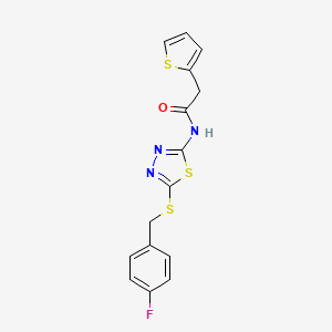 molecular formula C15H12FN3OS3 B2907000 N-[5-[(4-fluorophenyl)methylsulfanyl]-1,3,4-thiadiazol-2-yl]-2-thiophen-2-ylacetamide CAS No. 477215-90-0