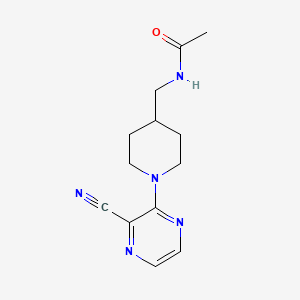 molecular formula C13H17N5O B2908407 N-((1-(3-cyanopyrazin-2-yl)piperidin-4-yl)methyl)acetamide CAS No. 1797124-93-6