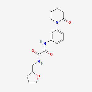 N1-(3-(2-oxopiperidin-1-yl)phenyl)-N2-((tetrahydrofuran-2-yl)methyl)oxalamide