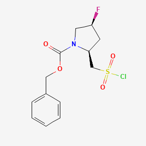molecular formula C13H15ClFNO4S B2909687 Benzyl (2S,4S)-2-(chlorosulfonylmethyl)-4-fluoropyrrolidine-1-carboxylate CAS No. 2382476-87-9