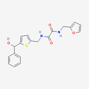 molecular formula C19H18N2O4S B2910074 N1-(furan-2-ylmethyl)-N2-((5-(hydroxy(phenyl)methyl)thiophen-2-yl)methyl)oxalamide CAS No. 2034314-80-0