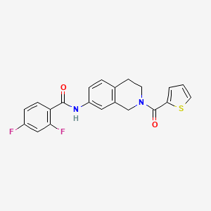 B2911677 2,4-difluoro-N-(2-(thiophene-2-carbonyl)-1,2,3,4-tetrahydroisoquinolin-7-yl)benzamide CAS No. 955689-98-2
