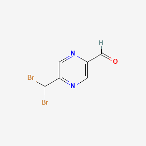 5-(Dibromomethyl)pyrazine-2-carbaldehyde