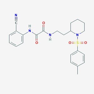 molecular formula C23H26N4O4S B2913782 N1-(2-氰基苯基)-N2-(2-(1-甲苯磺酰哌啶-2-基)乙基)草酰胺 CAS No. 898450-33-4