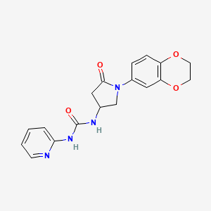 molecular formula C18H18N4O4 B2914038 1-(1-(2,3-Dihydrobenzo[b][1,4]dioxin-6-yl)-5-oxopyrrolidin-3-yl)-3-(pyridin-2-yl)urea CAS No. 897619-96-4