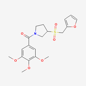 molecular formula C19H23NO7S B2914263 (3-((Furan-2-ylmethyl)sulfonyl)pyrrolidin-1-yl)(3,4,5-trimethoxyphenyl)methanone CAS No. 1788845-86-2