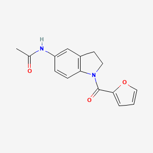 molecular formula C15H14N2O3 B2915090 N-(1-(furan-2-carbonyl)indolin-5-yl)acetamide CAS No. 1049529-06-7