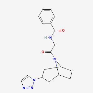 molecular formula C18H21N5O2 B2915545 N-{2-oxo-2-[3-(1H-1,2,3-triazol-1-yl)-8-azabicyclo[3.2.1]octan-8-yl]ethyl}benzamide CAS No. 2176270-67-8