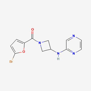 molecular formula C12H11BrN4O2 B2915873 N-[1-(5-bromofuran-2-carbonyl)azetidin-3-yl]pyrazin-2-amine CAS No. 2176069-66-0