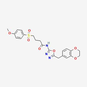 molecular formula C22H23N3O7S B2916820 N-(5-((2,3-dihydrobenzo[b][1,4]dioxin-6-yl)methyl)-1,3,4-oxadiazol-2-yl)-4-((4-methoxyphenyl)sulfonyl)butanamide CAS No. 922044-59-5