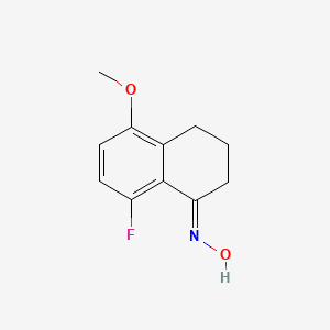 N-[(1E)-8-fluoro-5-methoxy-1,2,3,4-tetrahydronaphthalen-1-ylidene]hydroxylamine