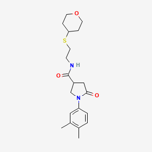 1-(3,4-dimethylphenyl)-N-[2-(oxan-4-ylsulfanyl)ethyl]-5-oxopyrrolidine-3-carboxamide