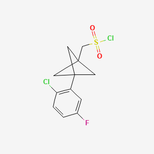 molecular formula C12H11Cl2FO2S B2920064 [3-(2-Chloro-5-fluorophenyl)-1-bicyclo[1.1.1]pentanyl]methanesulfonyl chloride CAS No. 2287343-34-2