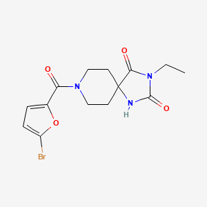8-(5-Bromofuran-2-carbonyl)-3-ethyl-1,3,8-triazaspiro[4.5]decane-2,4-dione