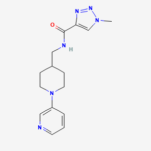 molecular formula C15H20N6O B2921068 1-methyl-N-((1-(pyridin-3-yl)piperidin-4-yl)methyl)-1H-1,2,3-triazole-4-carboxamide CAS No. 2034227-13-7
