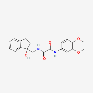 N1-(2,3-dihydrobenzo[b][1,4]dioxin-6-yl)-N2-((1-hydroxy-2,3-dihydro-1H-inden-1-yl)methyl)oxalamide