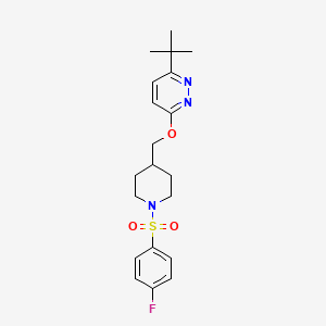 B2923536 3-Tert-butyl-6-[[1-(4-fluorophenyl)sulfonylpiperidin-4-yl]methoxy]pyridazine CAS No. 2379984-65-1