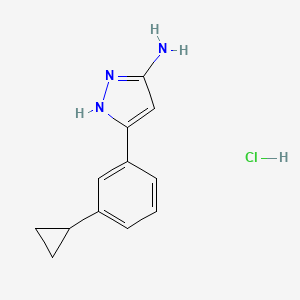 molecular formula C12H14ClN3 B2924296 5-(3-环丙基苯基)-1H-吡唑-3-胺；盐酸盐 CAS No. 2413870-34-3
