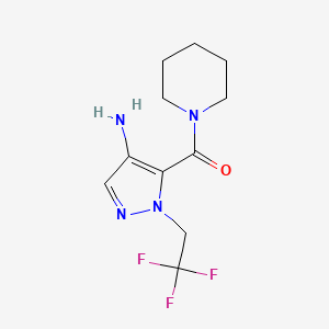 molecular formula C11H15F3N4O B2924416 5-(Piperidin-1-ylcarbonyl)-1-(2,2,2-trifluoroethyl)-1H-pyrazol-4-amine CAS No. 2101196-36-3